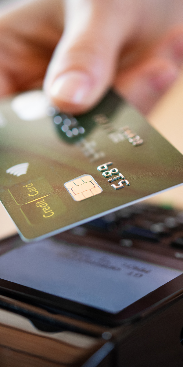 Person tapping card on terminal