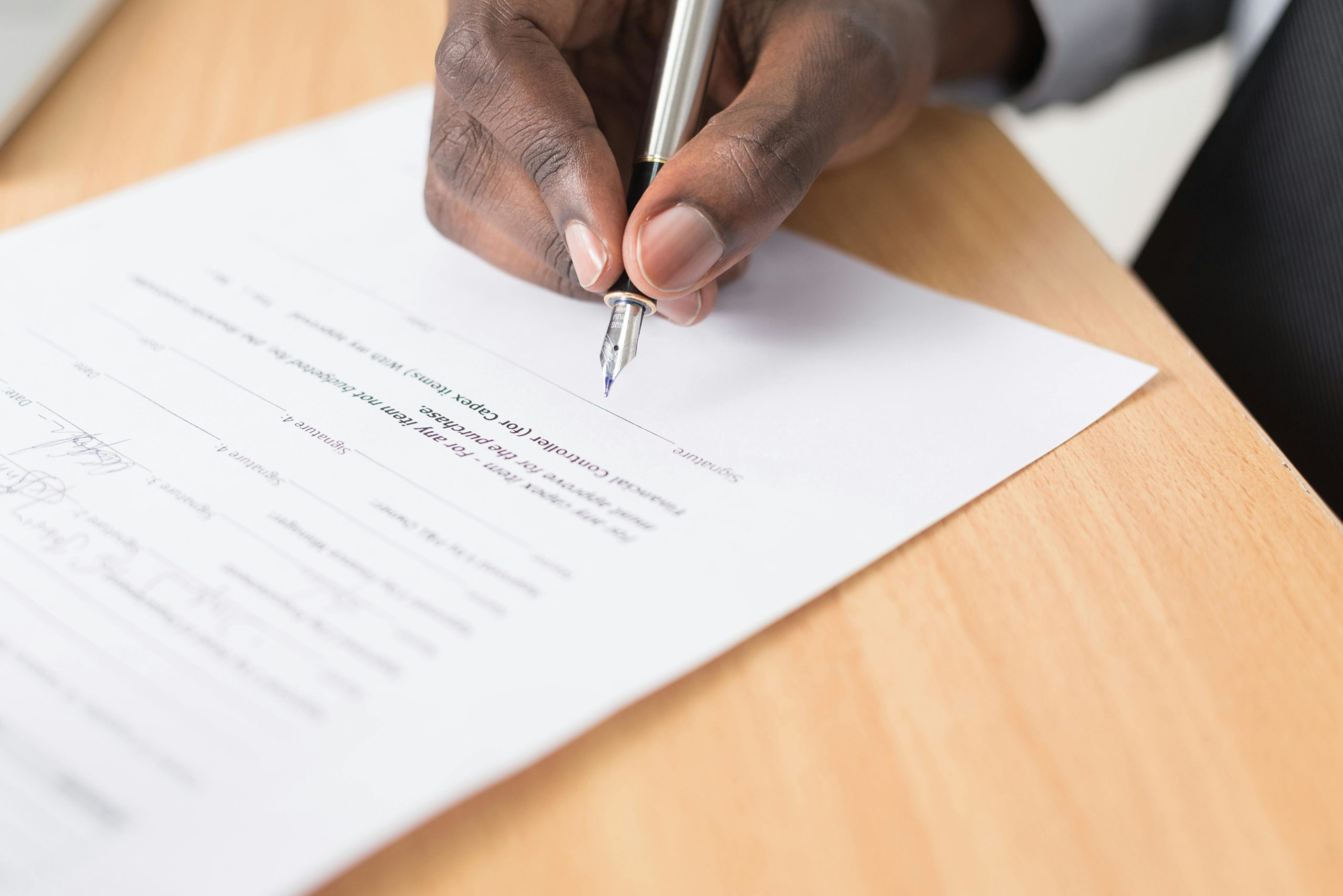 Man filling out paperwork